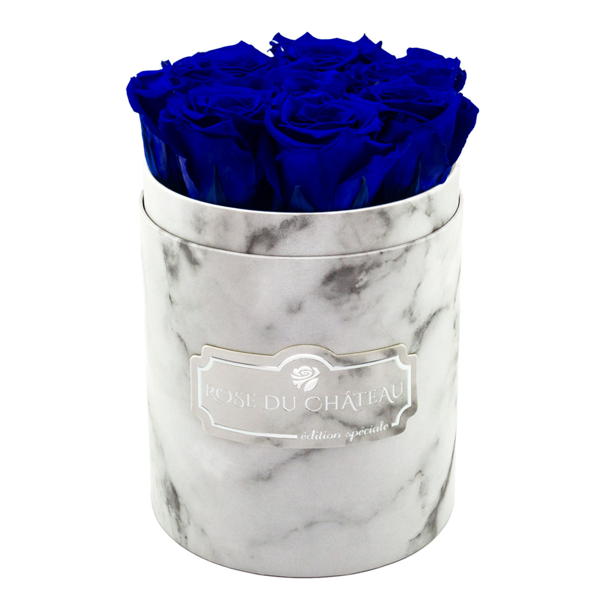 Blaue ewige Rosen in einer kleinen weißen Marmorbox Blaue ewige Rosen in einer kleinen weißen Marmorbox